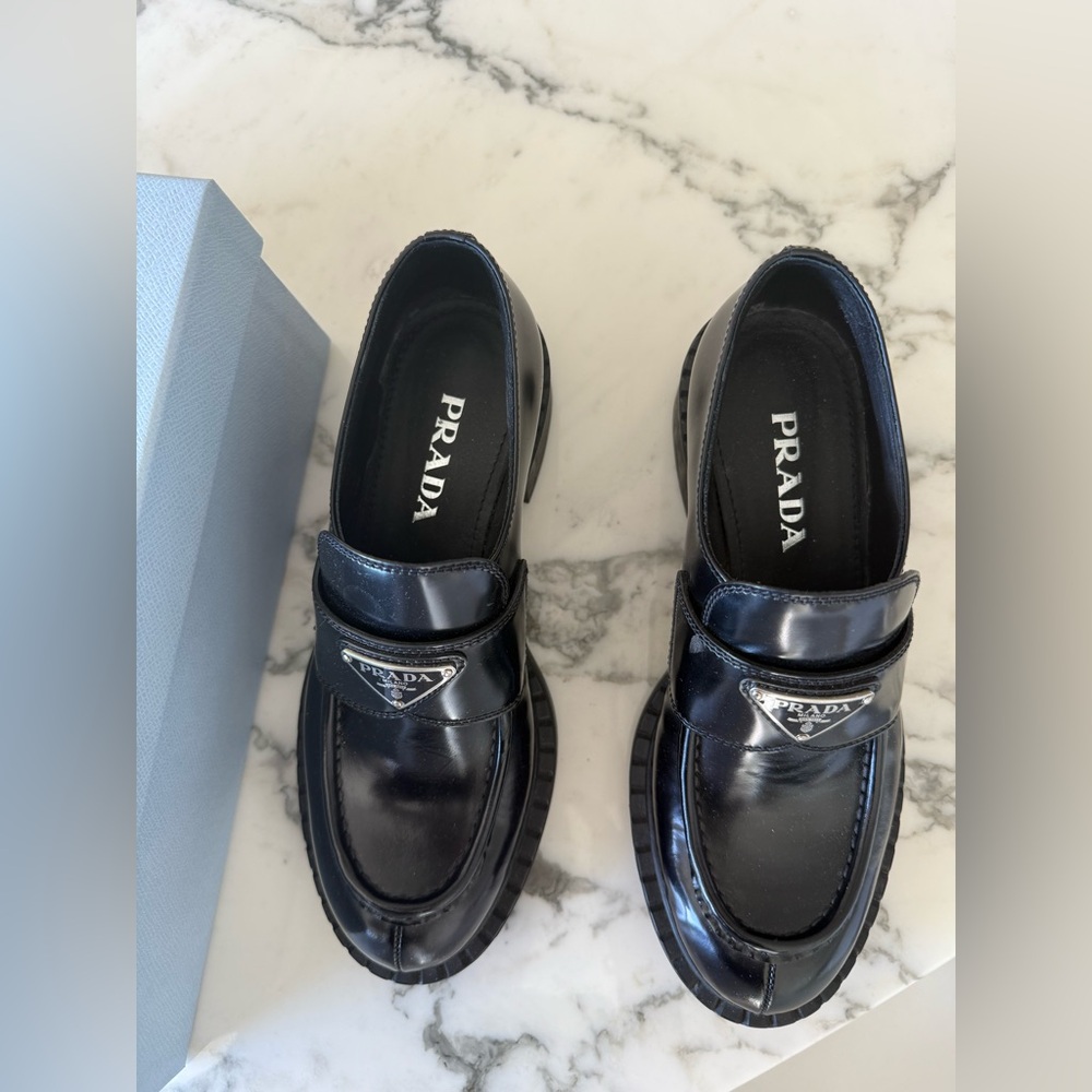 Prada leather loafers with triangle logo